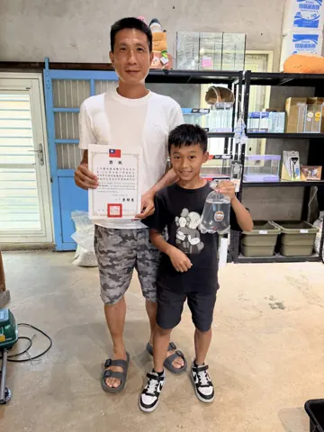 宇魚水族換鬥魚活動來店紀念照片 064